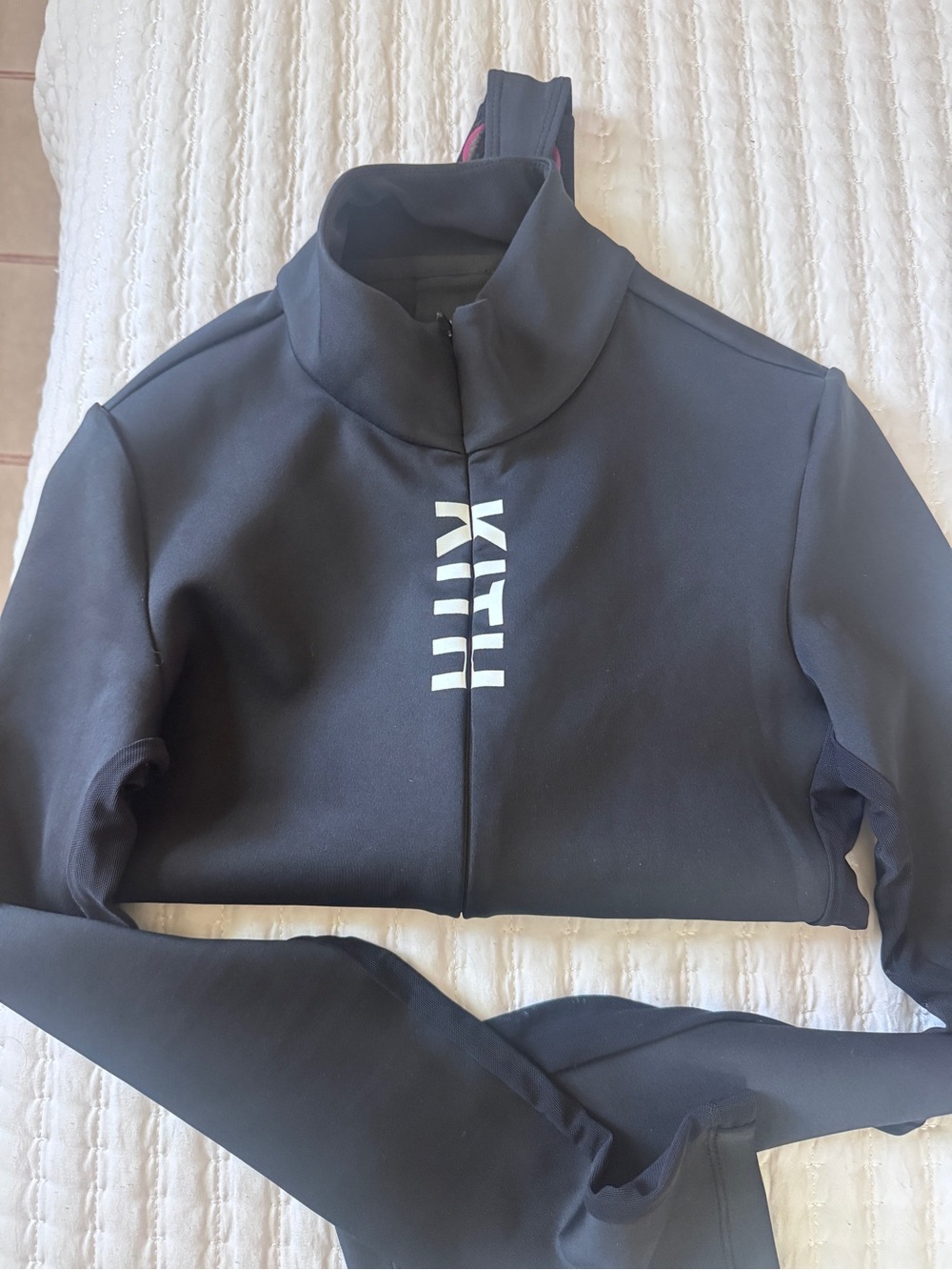 Kith body suit